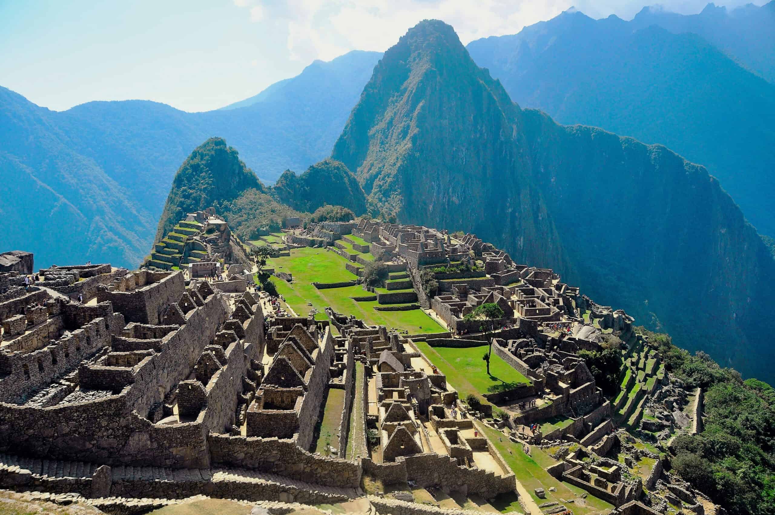 Ancient Machu Picchu ruins with terraces and stone structures in the Peruvian Andes.